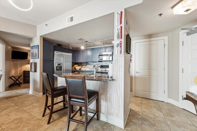 The kitchen includes a breakfast bar, perfect for