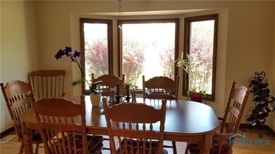 Lots of natural lighting in this kitchen/dining ro