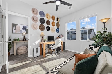 Office featuring hardwood / wood-style flooring an