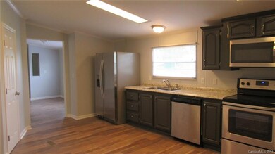 Walk in Pantry. All new SS Appliances. New flooring & counter tops.