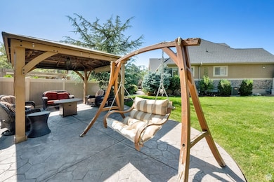 View of patio / terrace with an outdoor living space and a gazebo