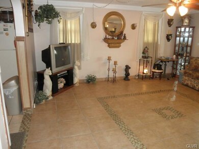 Spacious Living Room with Tile Flooring