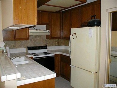 Kitchen includes refrigerator