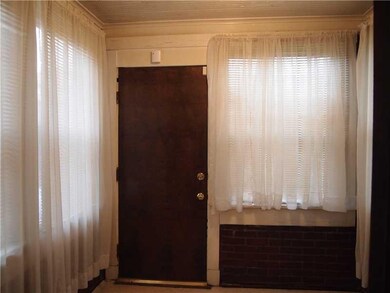 Exterior Front. Sunroom - kitchen could be expande