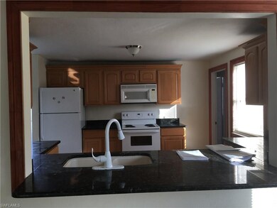 Kitchen with all granite counter tops
