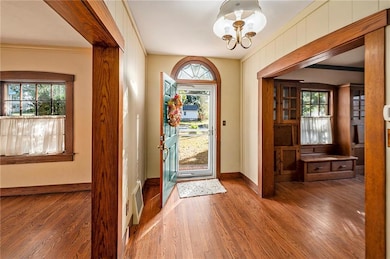 You'll love the two built-in bookcases and bench in the living room.