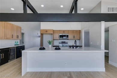 Kitchen with electric stove, stainless steel micro