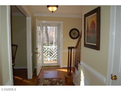Foyer - Hardwood foyer with storm door and deep cl