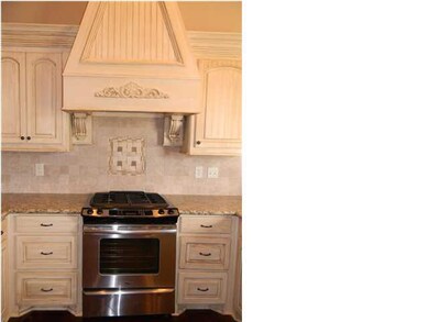 Gas range and granite slab countertops!