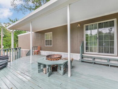Front of home also features a sliding glass window.