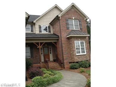 Exterior Front. Charming low maintenance exterior of brick, vinyl and stone