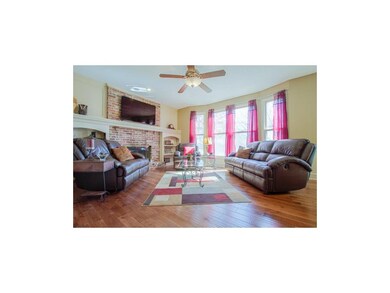 Nice built-ins w/fireplace.  Wall of windows givin