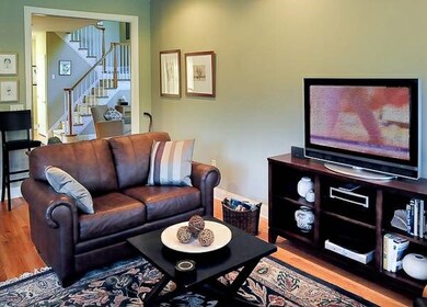 Family room with gas fireplace opens to eat in kit
