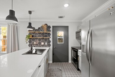 This stunning kitchen features stainless steel app