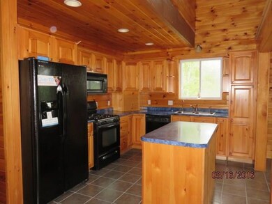 The kitchen is applianced and has a...