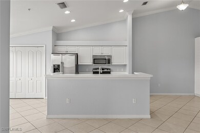 Kitchen with appliances with stainless steel finis