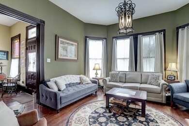 Large front living room with bay window. Front foy