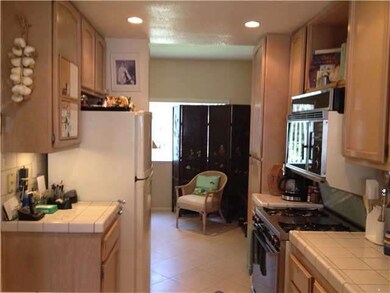 Kitchen is light and airy.  Easy access to dine ar