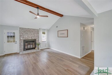 Living room towards hallway to bedrooms.