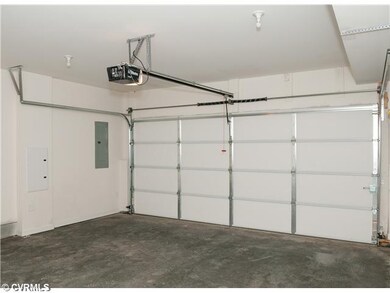 Parking Lot/Garage - Photo is of similar home in c