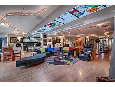 Living Room. Gracious entry way leads to this sky 