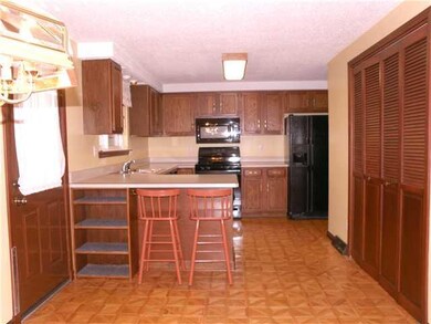 Kitchen. Kitchen measuring 24 x 9. Floor-to-ceilin
