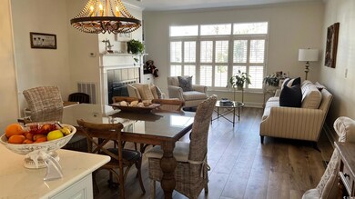 Dining space featuring a notable chandelier, ornam
