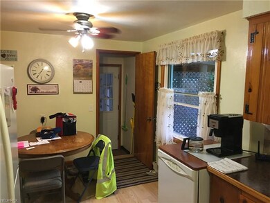 The door leads to the attached garage and to the f