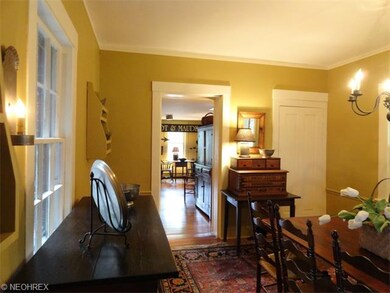 Dining room opens to foyer, screened porch and kit