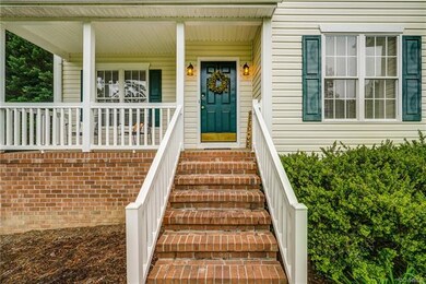 Low maintenance brick graces the front steps, porc