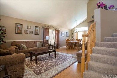 Formal living room open to formal dining room with