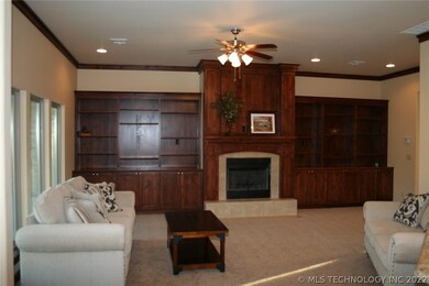 Great room with quality wood work.  Fireplace is f