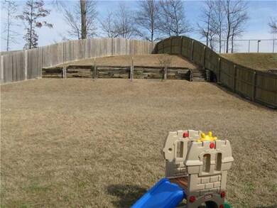 This fenced backyard is large enough to play socce