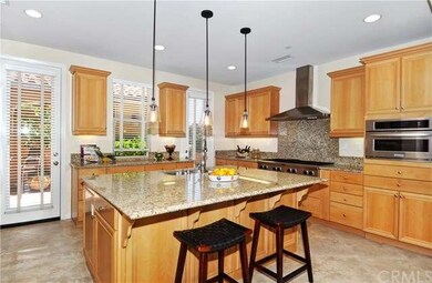 Gourmet Kitchen with Island dining and access to c