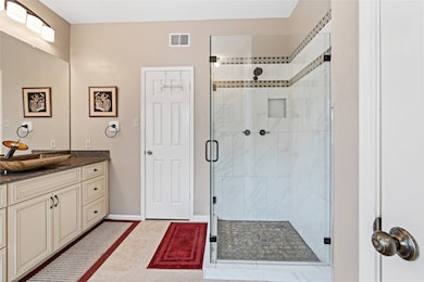 Enjoy a spa day from your house! tile flows throughout the floor and walls! Elegant touches that greet you every morning!