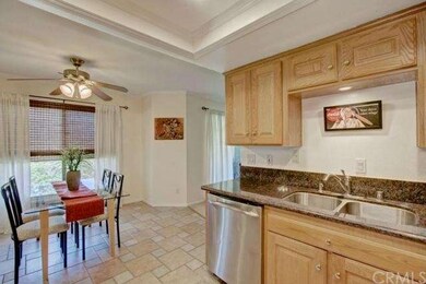 Kitchen area features separate dining area
