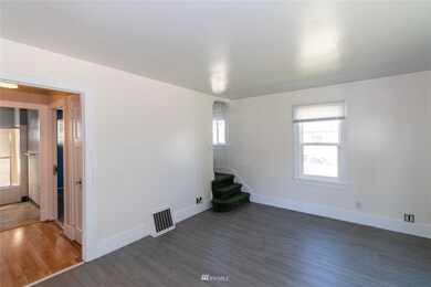 Large living room with new flooring.
