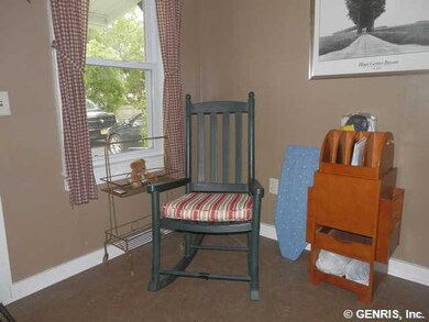 Exterior Front laundry and small setting room comi