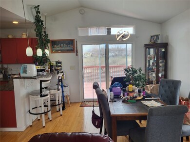 Vaulted ceiling dining area w/new slider w/blinds