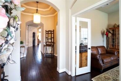 Study set at entry with French doors.