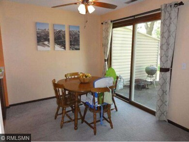 Dining room is light and bright.