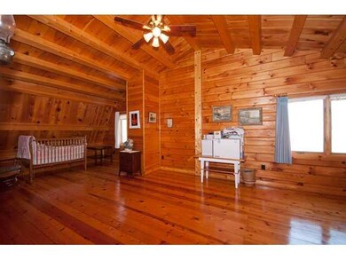 Bedroom 4. Gorgeous hardwood floors and amazing archetectual design.