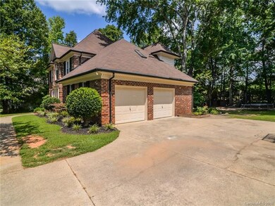 Long, wide drive way provides plenty of parking sp