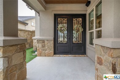 Love these double wrought iron doors!