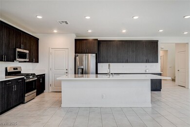 Kitchen featuring stainless steel appliances, ligh