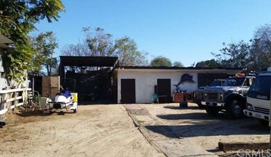 Back 3rd of lot with storage/stable areas