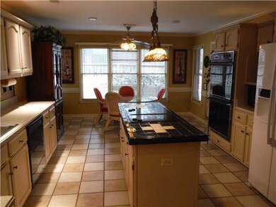 Full view of kitchen. Electrical outlets on either