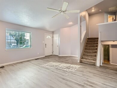 Large inviting living room with coat closet.