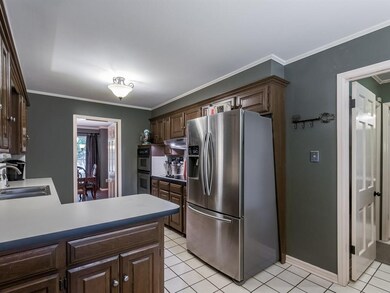 View of kitchen from dinette. Laundry room to the 