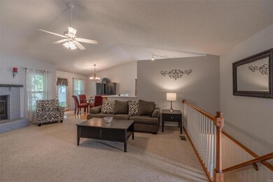 Great Room with view of stairs to lower level